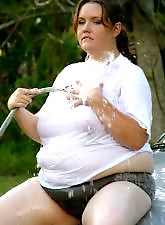 Gorgeous bbw hottie washing her car